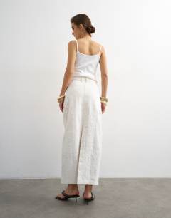 Model wearing Denim column maxi skirt in distressed ecru