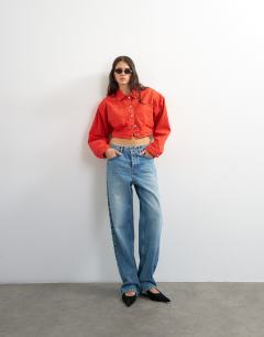 Model wearing Denim cropped shoulder pad jacket in red