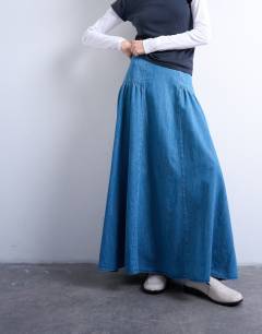 Model wearing Denim dropwaist maxi skirt in blue