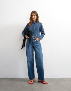 Model wearing Denim drummer boy jacket in rich blue