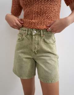 Model wearing Denim Editor short in apple green