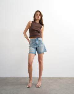Model wearing Denim Editor short in bleach