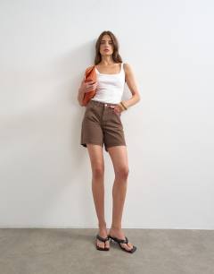 Model wearing Denim Editor short in brown