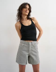 Model wearing Denim Editor short in ecru stripe