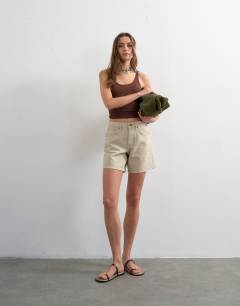 Model wearing Denim Editor short in oat