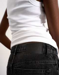 Model wearing Denim Editor short in washed black