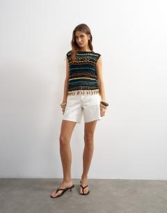 Model wearing Denim Editor short with raw hem in bone