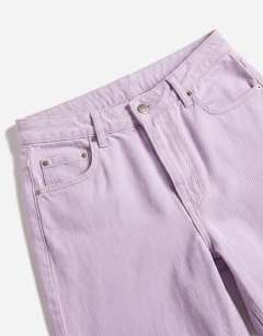 Model wearing Denim Editor shorts in lilac