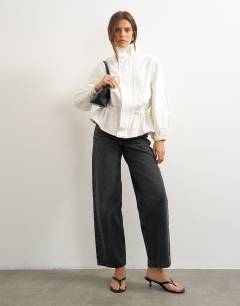 Model wearing Denim elasticated waist funnel sporty track jacket in bone