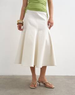 Model wearing Denim fit and flare maxi skirt in ecru