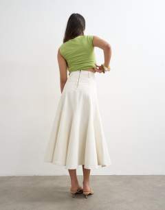 Model wearing Denim fit and flare maxi skirt in ecru