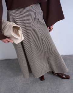 Model wearing Denim full circle maxi skirt in brown stripe