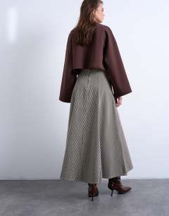 Model wearing Denim full circle maxi skirt in brown stripe