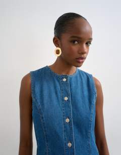 Model wearing Denim godet seam maxi dress in rich blue