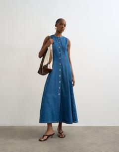 Model wearing Denim godet seam maxi dress in rich blue