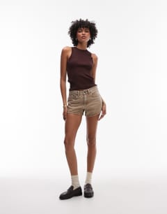 Model wearing Denim knicker shorts in washed beige