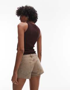 Model wearing Denim knicker shorts in washed beige