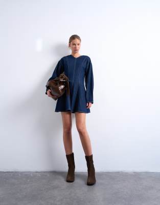 Denim long sleeve flared mini dress in rinse