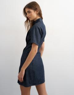 Model wearing Denim mandarin collared mini dress in indigo rinse