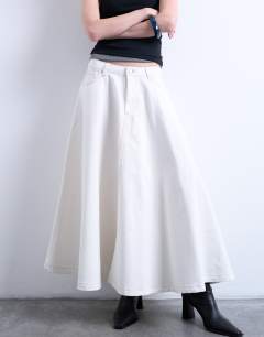 Model wearing Denim maxi full circle skirt in ecru