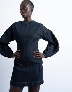 Model wearing Denim mini dress with ovoid sleeve in indigo