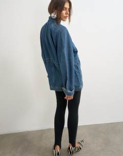 Model wearing Denim oversized jacket with elasticated waist detail in mid blue