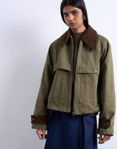 Model wearing Denim padded barn jacket with contrast cord collar in khaki
