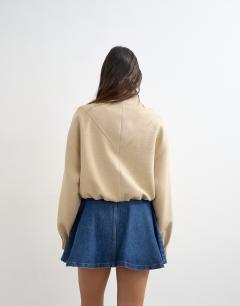 Model wearing Denim pleated full mini skirt in rich blue