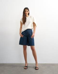 Denim pleated longline short in indigo rinse