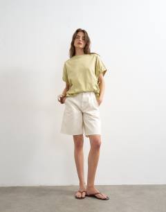 Denim pleated longline short in white