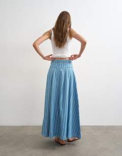Model wearing Denim pleated yoke maxi skirt in stripe