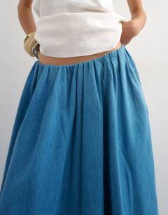 Model wearing Denim pull on circle maxi skirt in bleach