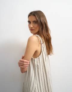 Model wearing Denim ruched shoulder maxi dress in stripe