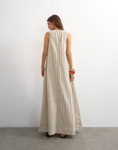 Model wearing Denim ruched shoulder maxi dress in stripe