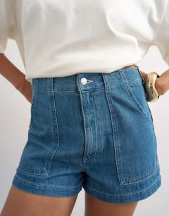 Model wearing Denim scout short in mid blue