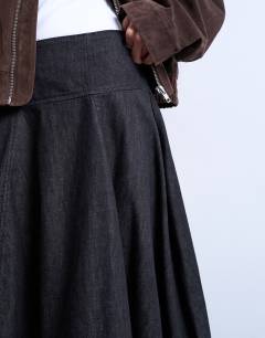 Model wearing Denim seamed barrel maxi skirt in black