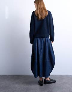 Model wearing Denim seamed barrel maxi skirt in rich blue