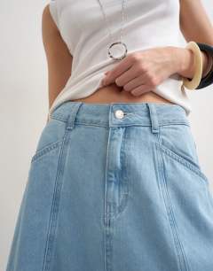 Model wearing Denim seamed circle skirt in bleach
