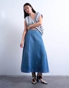 Model wearing Denim seamed circle skirt in mid blue