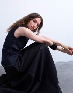 Model wearing Denim seamed full midi skirt in washed black