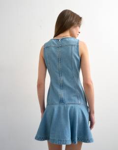 Model wearing Denim seamed mini dress in bleach