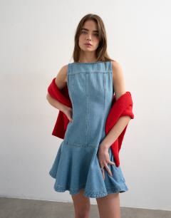 Model wearing Denim seamed mini dress in bleach