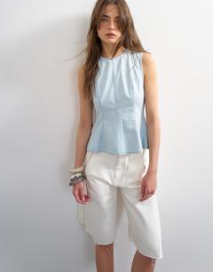Denim seamed peplum top in bleach