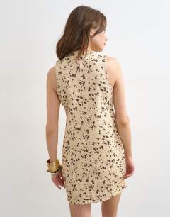 Model wearing Denim shift dress in animal print