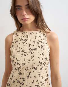 Model wearing Denim shift dress in deer print