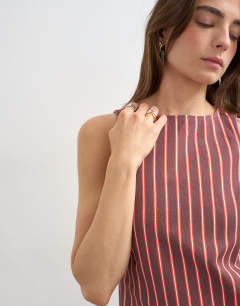 Model wearing Denim shift mini dress red and pink stripe