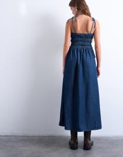 Model wearing Denim shirred maxi dress with straps in mid blue