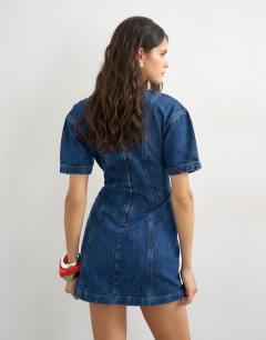 Model wearing Denim short sleeve mini dress in mid blue