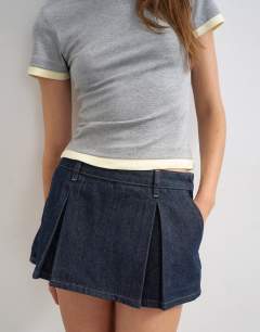 Model wearing Denim skort in indigo rinse