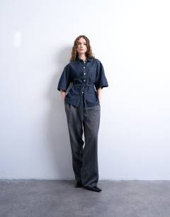 Model wearing Denim tie back oversized boxy shirt in